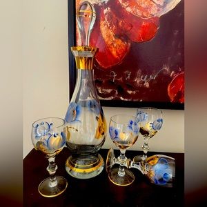 Vintage hand painted, gold trimmed decanter and four glasses